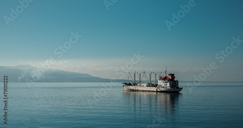 Large commercial fishing vessel in the sea. Big fishing ship in the sea in the coast of Albania. Deep sea fishing