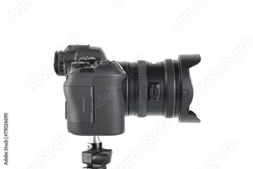 Big Black and Modern digital mirrorless Camera full frame sensor with lens on white background. photo