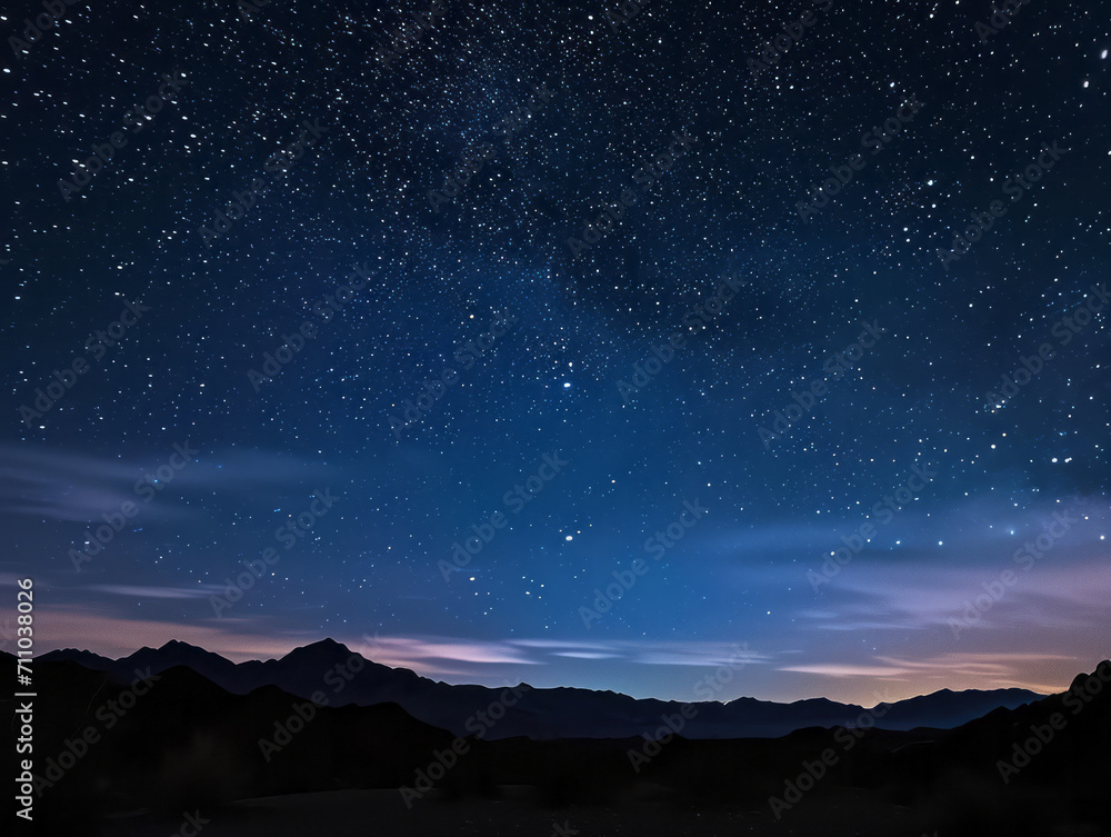 Night sky with stars and mountains. Elements of this image furnished by NASA