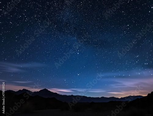 Night sky with stars and mountains. Elements of this image furnished by NASA