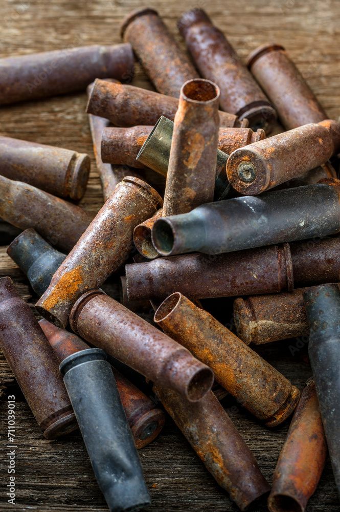 Close-Up 4K Ultra HD Image of Old Rusted Empty Shell Casings - Historical Artifacts