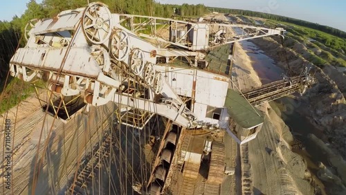 Big absetzer near railway at sandpit during sunset. Aerial view photo