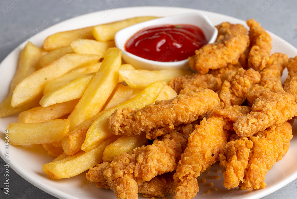 Homemade Crispy Chicken Tenders and French Fries Homemade Crispy Chicken Tenders and French Fries