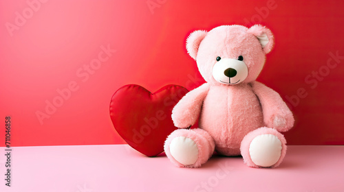 teddy bear with red heart on red background gift for valentine's day concept