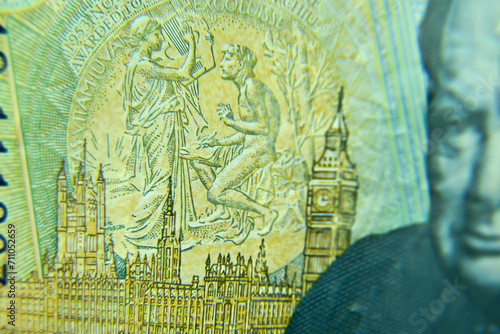 London, UK, 2 January 2024: British five pounds sterling banknote  closeup with selective focus. Portrait of Sir Winston Churchill, Prime Minister of the United Kingdom photo