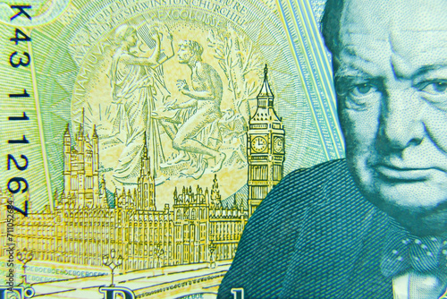 London, UK, 2 January 2024: British five pounds sterling banknote  closeup with selective focus. Portrait of Sir Winston Churchill, Prime Minister of the United Kingdom 
