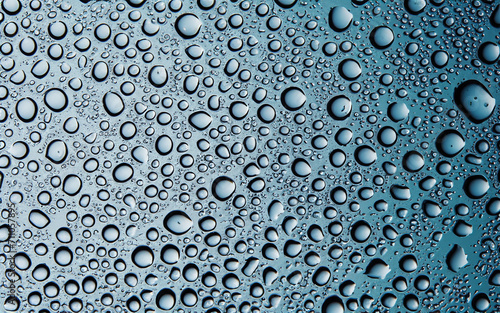 Water Condesation Dropletes on Blue Glass