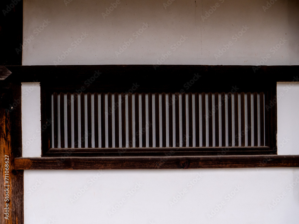 Beautiful window wood paneling in classical style at Kasuga Taisha Shrine in Nara, Japan. Beautiful window wood paneling in classical style at Kasuga Taisha Shrine in Nara, Japan.