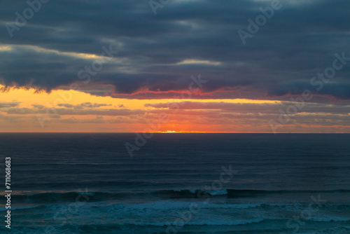 A Golden Dawn Breaks Over Gold Coast   s Tranquil Sea