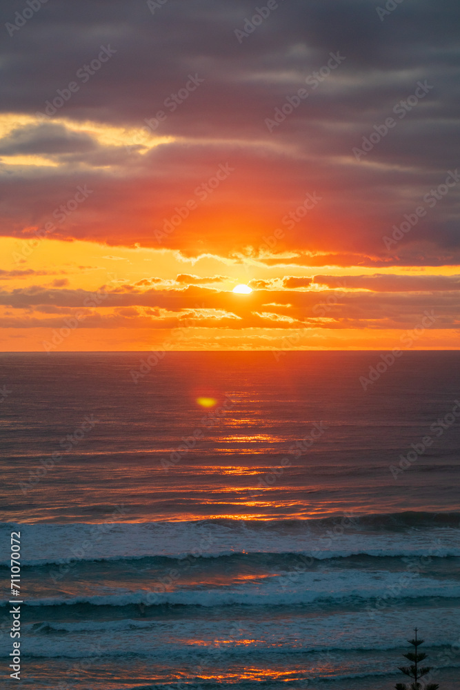 Fototapeta premium Golden Sunrise Over Gold Coast Beach