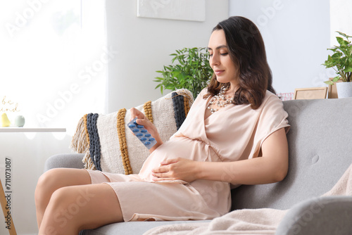 Young pregnant woman with F...