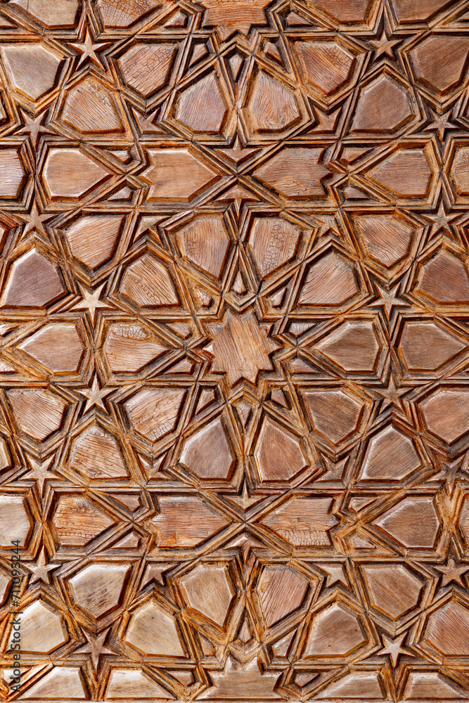 Islamic style geometric carving detail with intricate star shapes