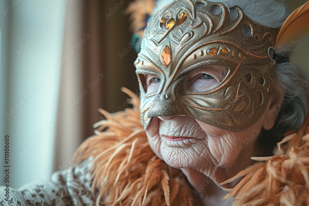 An elderly woman of advanced age dressed in a Venetian mask and with peach-colored feathers during the carnival, wisdom and beauty in every wrinkle, a life rich in experiences An elderly woman of advanced age dressed in a Venetian mask and with peach-colored feathers during the carnival, wisdom and beauty in every wrinkle, a life rich in experiences