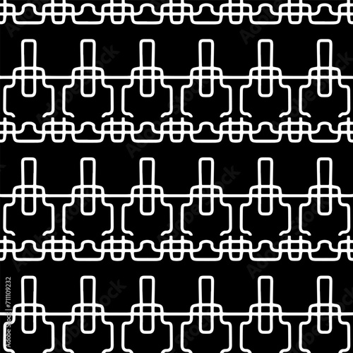  White background with black pattern. Seamless texture for fashion, textile design, on wall paper, wrapping paper, fabrics and home decor. Simple repeat pattern.