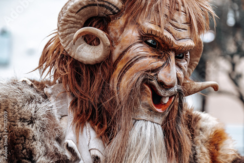 Krampus monster costume.Carnival processions in Germany.Carnival costumes and characters.Winter costume processions on the streets of Europe.Traditional cultural folklore festival  photo