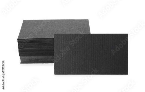 Many blank black business cards isolated on white. Mockup for design