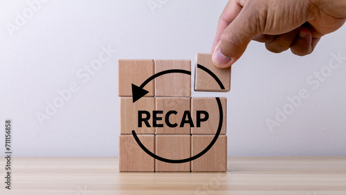 Recap economy, business, financial concept. For business planning. RECAP word icon on wooden cubes on smart white background and copy space. photo