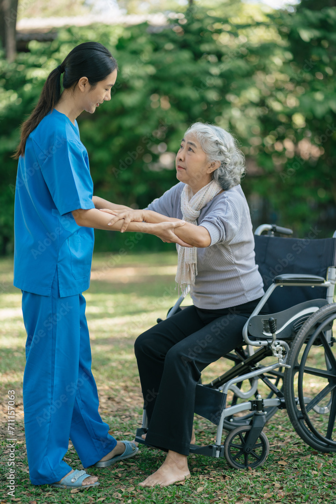 Professional physiotherapist taking care of senior patient during rehabilitation. Professional physiotherapist taking care of senior patient during rehabilitation.