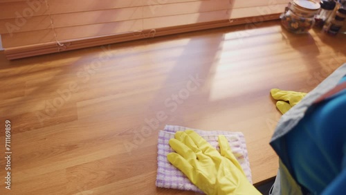 Close up hands of cleaning service woman worker clean kitchen at home. 