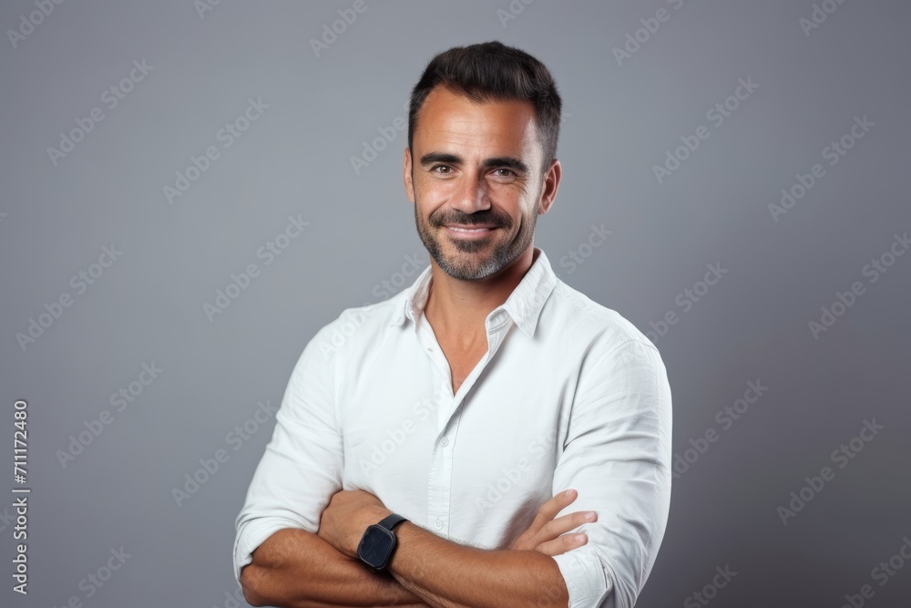 Portrait of a handsome middle-aged man in a white shirt. Portrait of a handsome middle-aged man in a white shirt.