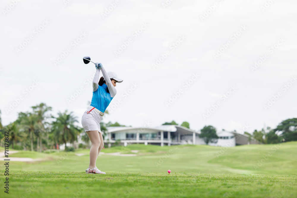 Professional woman golfer practice in golf course