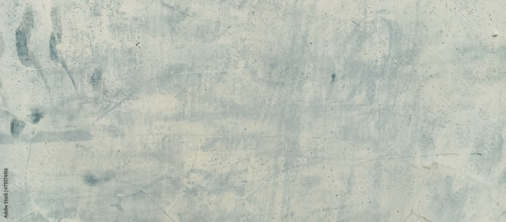 Fototapeta premium The texture of the old cement wall of gray paint, the background texture of the old cement wall of gray paint