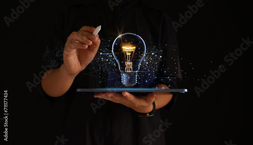 Creative solutions or ideas for designing innovative web banners or hand-drawn landing page templates coming out of tablet screens with colorful abstract geometric bulbs and leading lines.