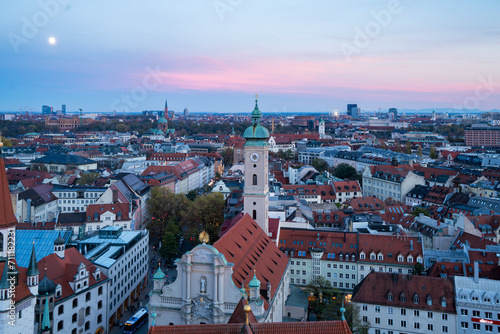 Aerial Munich Cityscape with Church Tower and Moonrise at Sunset