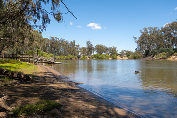Murray River at Cobram, bordered by an Australian native natural bush. The inland regional town is on the border between Victoria and New South Wales.