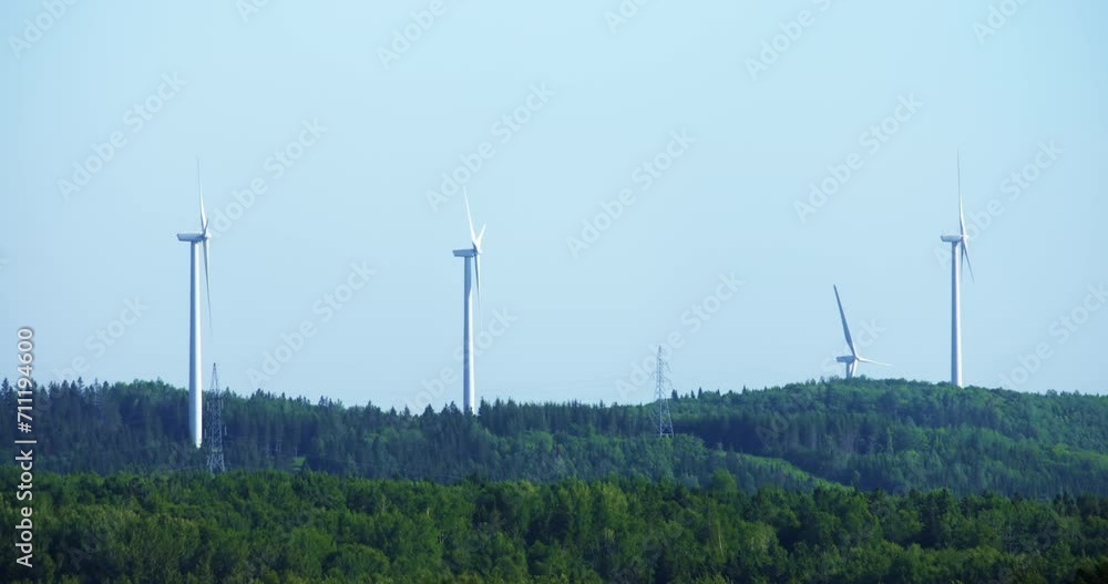 Windmill turbine on hill / Matane Windmill turbine on hill / Matane