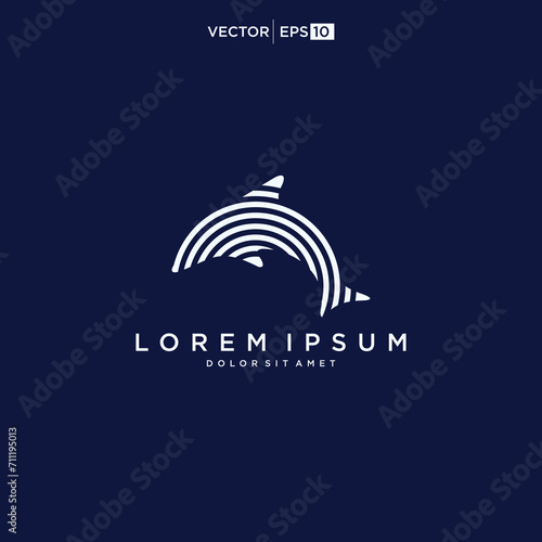 Dolphin logo. Dolphins jump on the waves of the sea or the beach