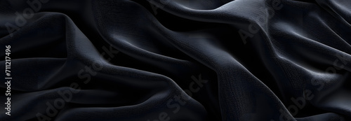 Black shiny ripple silky satin fabric texture display as background. copy space, mock up, presentation. 