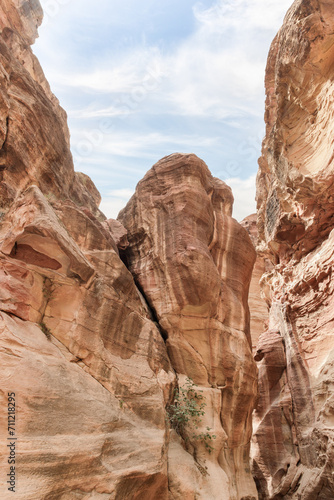 The beauty of high mountains at beginning of gorge Al Siq in Nabatean kingdom of Petra in the Wadi Musa city in Jordan