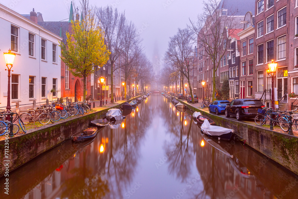 Amsterdam canal Groenburgwal with Zuiderkerk, southern church, Holland, Netherlands.
