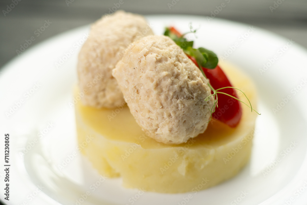 Healthy chicken cutlets from minced meat with mashed potato and vegetables in restaurant Healthy chicken cutlets from minced meat with mashed potato and vegetables in restaurant