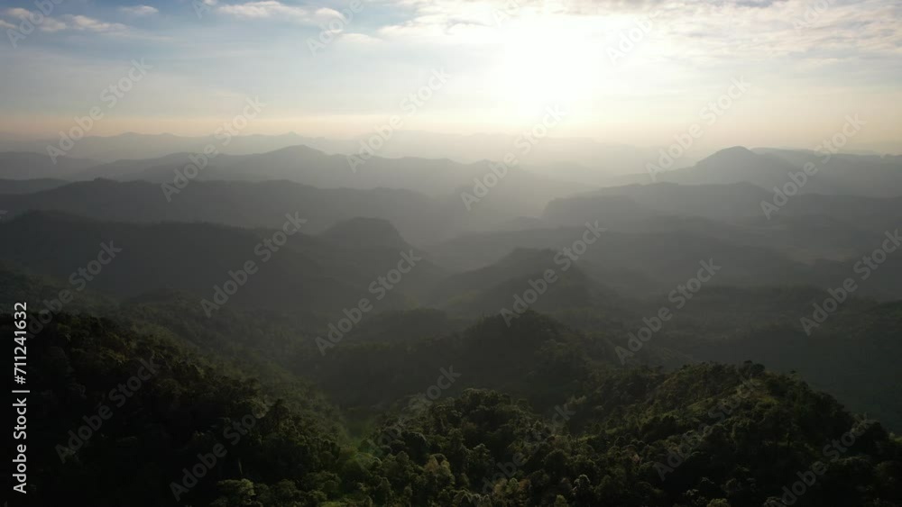 Aerial landscape view of greenery rainforest and mountains road by drone Aerial landscape view of greenery rainforest and mountains road by drone
