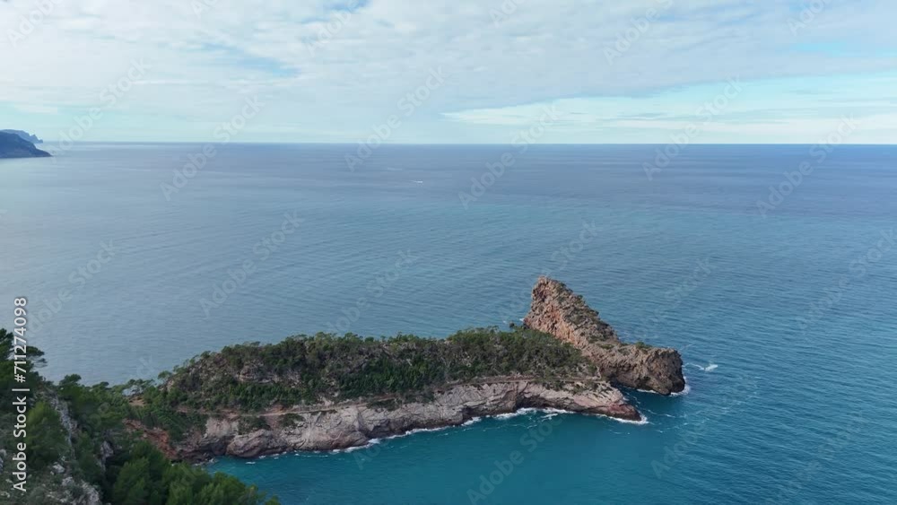 Drone shot of famous Mirador de sa Foradada and seascape of Mallorca in background Drone shot of famous Mirador de sa Foradada and seascape of Mallorca in background