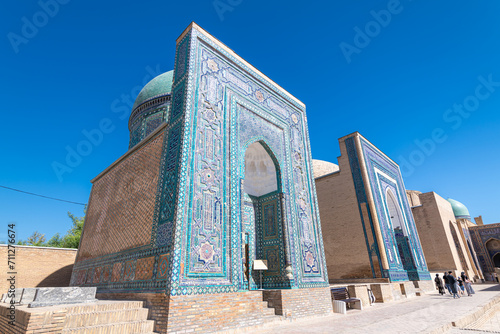 Symmetrical decorative ornament of entrance to the tomb in Shah-I-Zinda photo