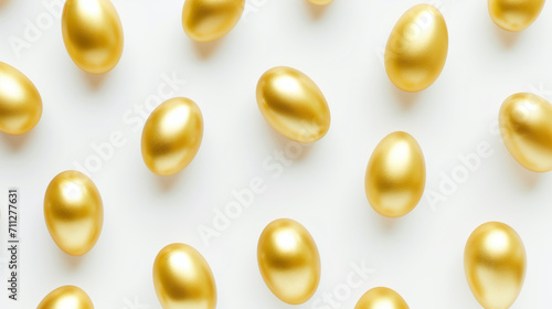A collection of golden eggs on a white background, symbolizing wealth or Easter holiday concept