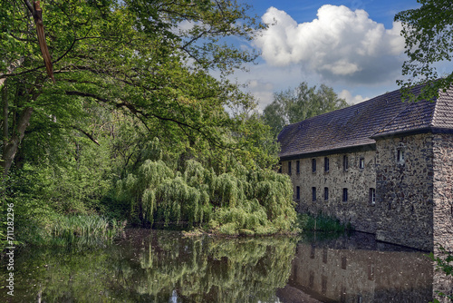 medieval historic Water Castle called Haus Graven or Wasserburg,Langenfeld-Wiescheid,Rhineland,Germany photo