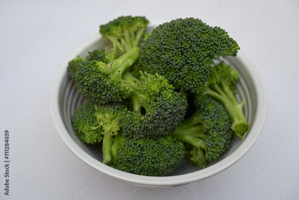 Broccoli Isolated on white background. Its other names Brassica oleracea var italica. This is an edible green plant in the cabbage family. Broccoli is a particularly rich source of vitamin C and K. Broccoli Isolated on white background. Its other names Brassica oleracea var italica. This is an edible green plant in the cabbage family. Broccoli is a particularly rich source of vitamin C and K.