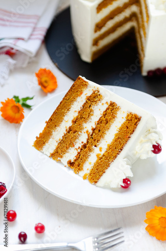 Slice of fresh homemade carrot cake With Cream Cheese Frosting