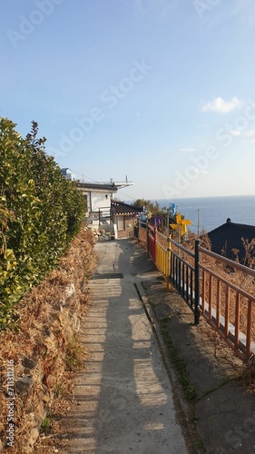 a quiet alley with a view of the sea