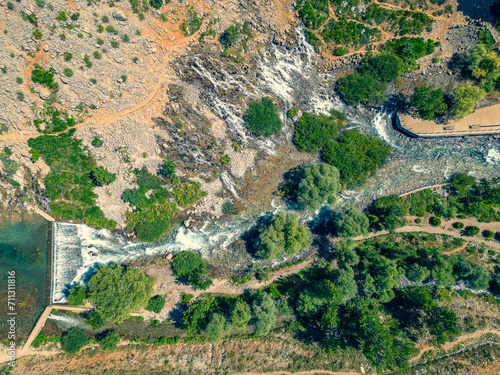 Tunceli Munzur mountain and the water flowing from the rocks photo