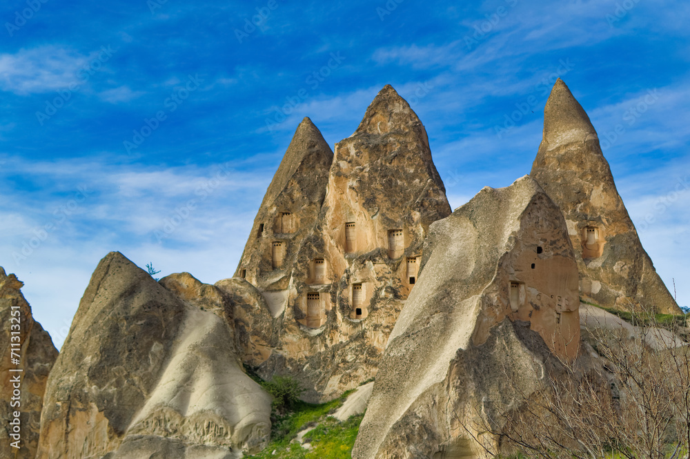 Typical Cappadocia landscape soft volcanic rock, shaped by erosion in Goreme, Turkey.