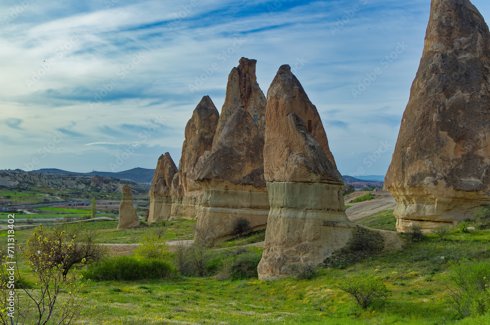 Typical Cappadocia landscape soft volcanic rock, shaped by erosion in Goreme, Turkey.