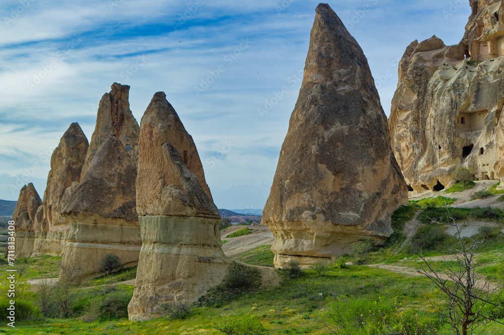 Typical Cappadocia landscape soft volcanic rock, shaped by erosion in Goreme, Turkey.