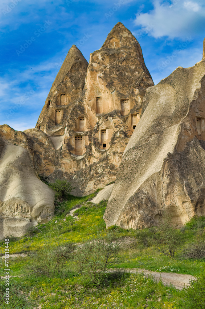 Typical Cappadocia landscape soft volcanic rock, shaped by erosion in Goreme, Turkey.