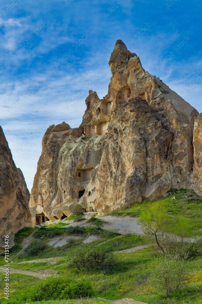 Typical Cappadocia landscape soft volcanic rock, shaped by erosion in Goreme, Turkey.