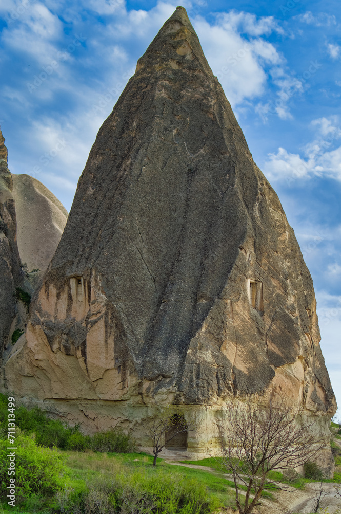 Typical Cappadocia landscape soft volcanic rock, shaped by erosion in Goreme, Turkey.